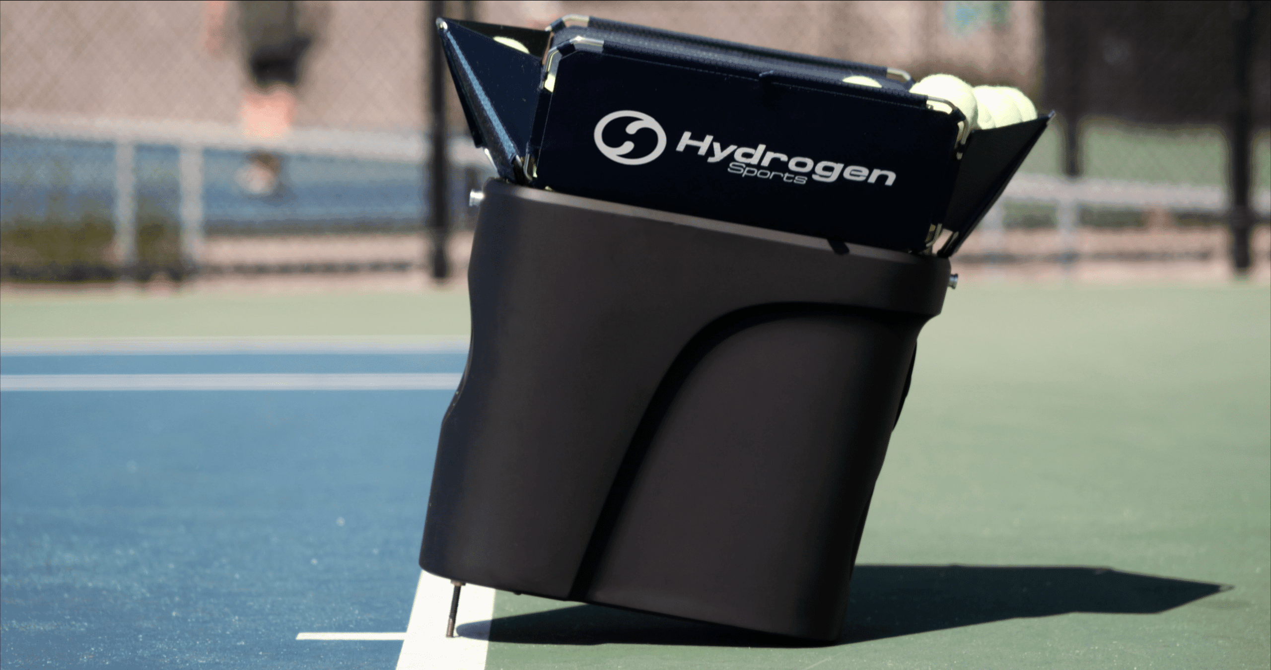 Portable tennis ball machine