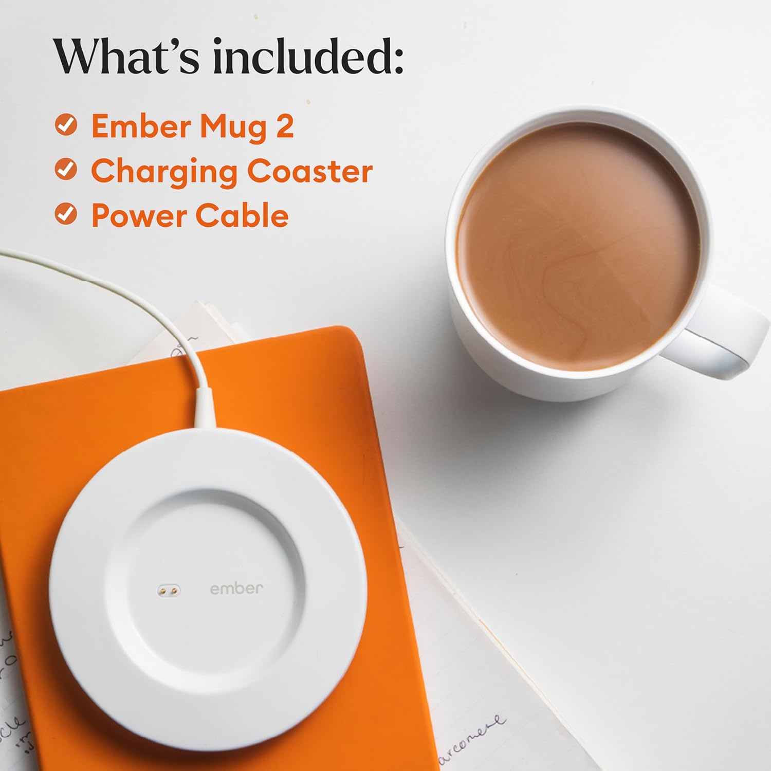 Ember Smart Mug 2 sitting on a modern desk beside a laptop and notebook SEO Tags: